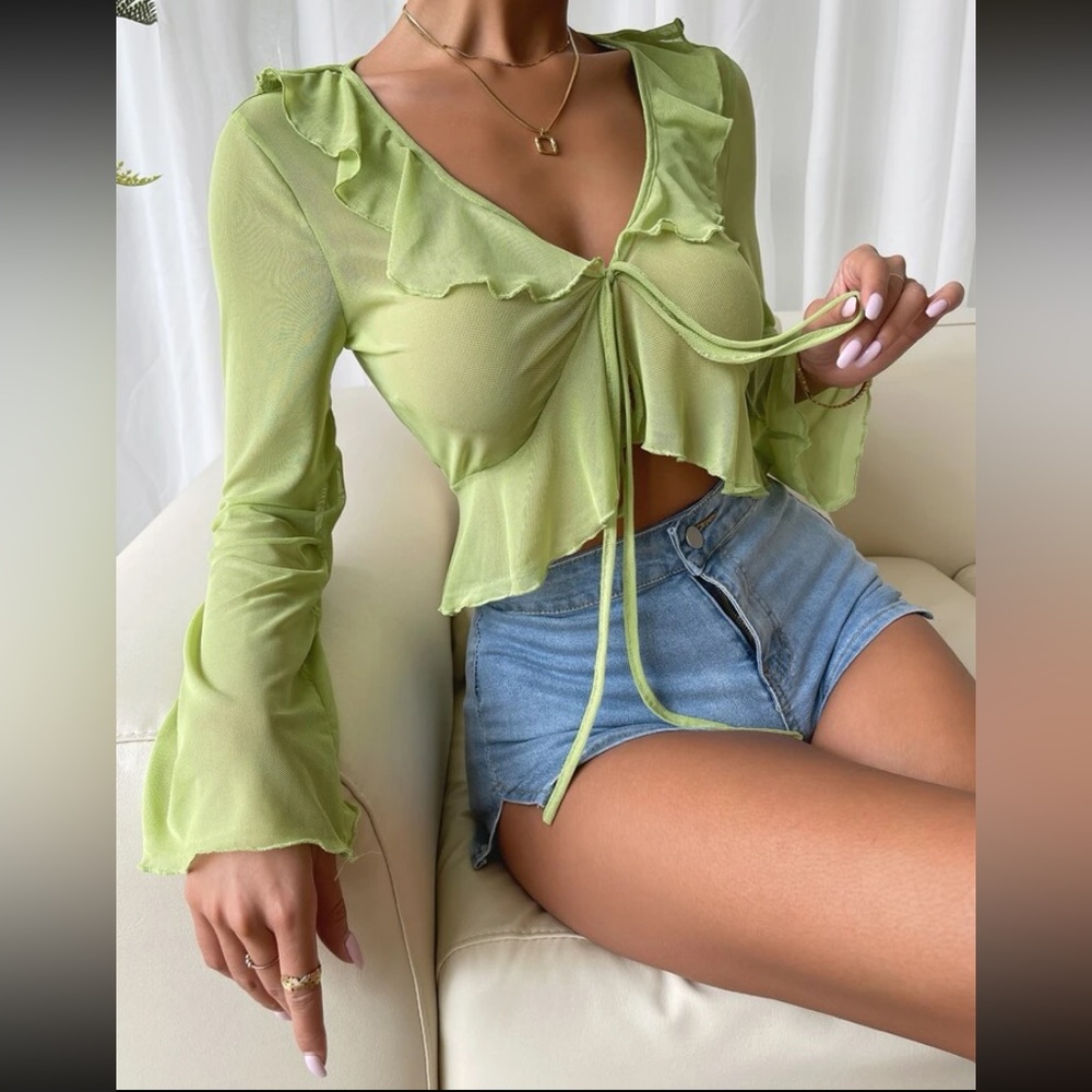 Never worn ruffle and knot flounce sleeve mesh crop tie top.